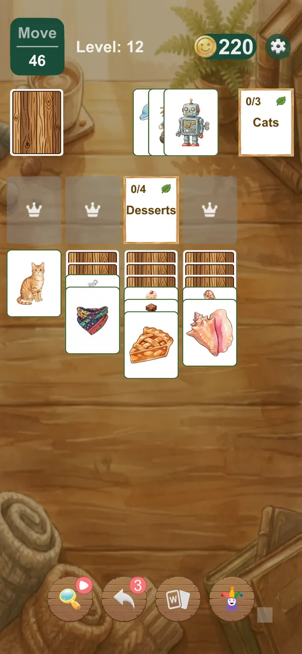 Picture Solitaire board with Cats and Desserts categories, a robot in the draw pile, and cat, scarf, pie and seashell cards.